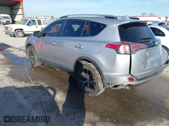 ✅ 2018 Toyota RAV4 Hybrid SE • VIN: JTMJJREV4JD175520 • Lot: 43618778. Listed on IAAI with 98,003 mi. Free auction sales archive from the USA and detailed vehicle history report at DreamBid. Image 3.