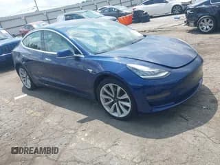 ✅ 2018 Tesla Model 3 Long Range Battery • VIN: 5YJ3E1EB3JF097759 • Lot: 43006210. Listed on IAAI with 122,119 mi. Free auction sales archive from the USA and detailed vehicle history report at DreamBid. Image 1.