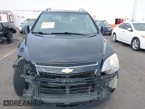 ✅ 2013 Chevrolet Captiva Sport LS • VIN: 3GNAL2EK8DS599463 • Lot: 41640921. Wystawiony na IAAI z przebiegiem 163 789 mil. Bezpłatny archiwum sprzedaży aukcyjnych z USA i szczegółowy raport historii pojazdu na DreamBid. Zdjęcie 13.