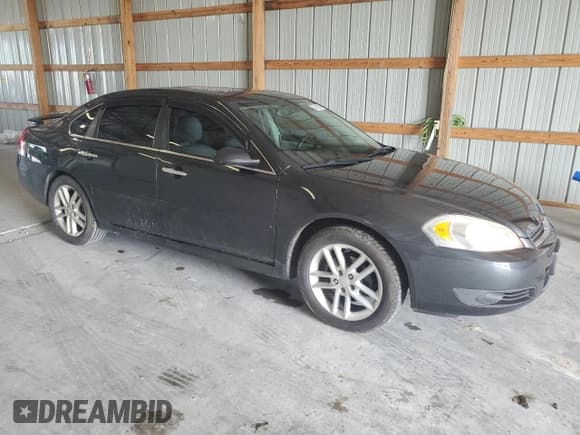 ✅ 2014 Chevrolet Impala LTZ • VIN: 2G1WC5E30E1131094 • Lot: 57468295. Listed on Copart with 196,198 mi. Free auction sales archive from the USA and detailed vehicle history report at DreamBid. Image 4.