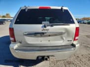 ✅ 2009 Jeep Grand Cherokee • VIN: 1J8HR68T69C520847 • Lot: 89548155. Listed on Copart with 322,340 mi. Free auction sales archive from the USA and detailed vehicle history report at DreamBid. Image 6.