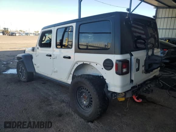 ✅ 2023 Jeep Wrangler • VIN: 1C4JJXN69PW646233 • Лот: 82087925. Опубликован ранее на Copart с пробегом Не указан. Бесплатный доступ к архиву аукционных продаж из США и подробный отчёт об истории автомобиля на DreamBid. Изображение 2.