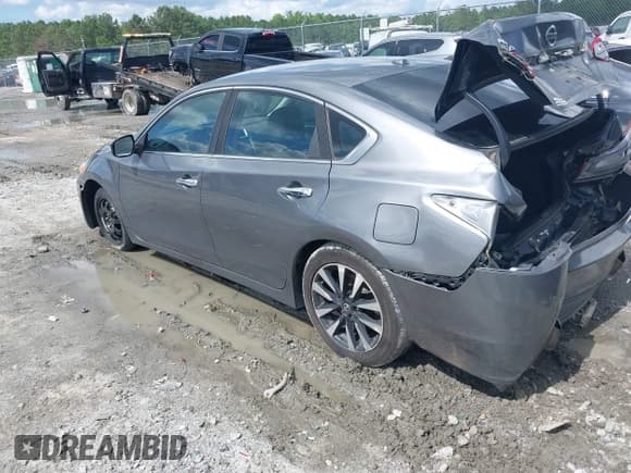 ✅ 2018 Nissan Altima SV • VIN: 1N4AL3AP2JC145801 • Lot: 42518041. Listed on IAAI with 155,091 mi. Free auction sales archive from the USA and detailed vehicle history report at DreamBid. Image 3.