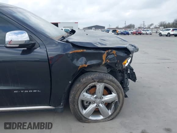 ✅ 2013 Dodge Durango Citadel • VIN: 1C4RDHEG5DC504757 • Lot: 41696972. Listed on IAAI with 133,049 mi. Free auction sales archive from the USA and detailed vehicle history report at DreamBid. Image 17.