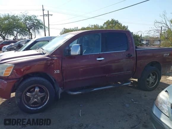 ✅ 2004 Nissan Titan SE • VIN: 1N6AA07B94N520633 • Lot: 42967037. Listed on IAAI with 239,838 mi. Free auction sales archive from the USA and detailed vehicle history report at DreamBid. Image 14.
