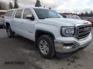 ✅ 2018 GMC Sierra 1500 SLE • VIN: 3GTU2MEC4JG296644 • Lot: 43752275. Listed on IAAI with 149,436 mi. Free auction sales archive from the USA and detailed vehicle history report at DreamBid. Image 1.