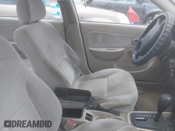 ✅ 2003 Kia Spectra • VIN: KNAFB121535246949 • Lot: 42402307. Listed on IAAI with 98,678 mi. Free auction sales archive from the USA and detailed vehicle history report at DreamBid. Image 5.