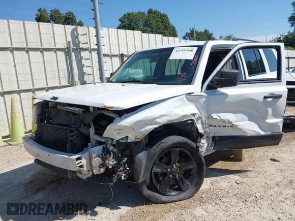 ✅ 2014 Jeep Patriot Sport • VIN: 1C4NJPBA5ED754609 • Lot: 43319560. Listed on IAAI with 228,812 mi. Free auction sales archive from the USA and detailed vehicle history report at DreamBid. Image 6.