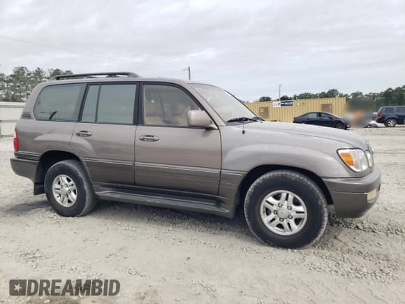 ✅ 2000 Lexus LX 470 • VIN: JT6HT00W6Y0109757 • Lot: 70261564. Wystawiony na Copart z przebiegiem 326 759 mil. Bezpłatny archiwum sprzedaży aukcyjnych z USA i szczegółowy raport historii pojazdu na DreamBid. Zdjęcie 4.