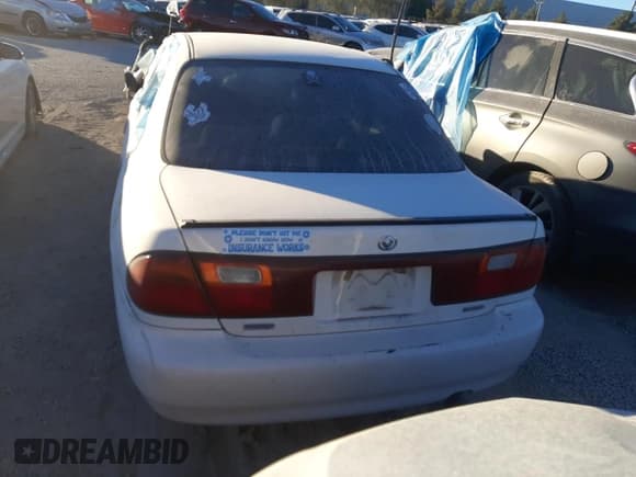 ✅ 1995 Mazda Protege • VIN: JM1BA1417S0163892 • Lot: 71871184. Listed on Copart with 161,265 mi. Free auction sales archive from the USA and detailed vehicle history report at DreamBid. Image 6.