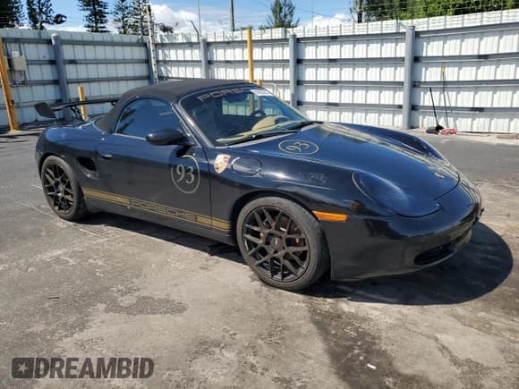 ✅ 1999 Porsche Boxster • VIN: WP0CA2988XU621567 • Lot: 84265325. Listed on Copart with 142,585 mi. Free auction sales archive from the USA and detailed vehicle history report at DreamBid. Image 4.