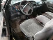 ✅ 1999 Dodge 1500 • VIN: 1B7HF16Y5XS150818 • Lot: 83490054. Listed on Copart with 118,584 mi. Free auction sales archive from the USA and detailed vehicle history report at DreamBid. Image 8.