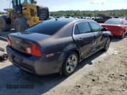 ✅ 2011 Chevrolet Malibu 1LS • VIN: 1G1ZB5E12BF174869 • Lot: 72784854. Listed on Copart with 288,576 mi. Free auction sales archive from the USA and detailed vehicle history report at DreamBid. Image 3.