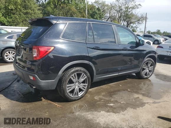 ✅ 2021 Honda Passport EX-L • VIN: 5FNYF7H52MB008733 • Lot: 70511625. Listed on Copart with 75,441 mi. Free auction sales archive from the USA and detailed vehicle history report at DreamBid. Image 3.