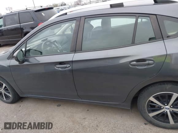✅ 2021 Subaru Impreza Premium • VIN: 4S3GTAD6XM3703426 • Lot: 41760749. Listed on IAAI with 47,427 mi. Free auction sales archive from the USA and detailed vehicle history report at DreamBid. Image 14.