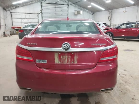 ✅ 2014 Buick LaCrosse • VIN: 1G4GA5G39EF215045 • Lot: 43485222. Listed on IAAI with 128,734 mi. Free auction sales archive from the USA and detailed vehicle history report at DreamBid. Image 16.
