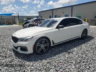 ✅ 2016 BMW 7 Series 750i • VIN: WBA7F0C51GGM20434 • Lot: 62339175. Listed on Copart with 83,059 mi. Free auction sales archive from the USA and detailed vehicle history report at DreamBid. Image 1.