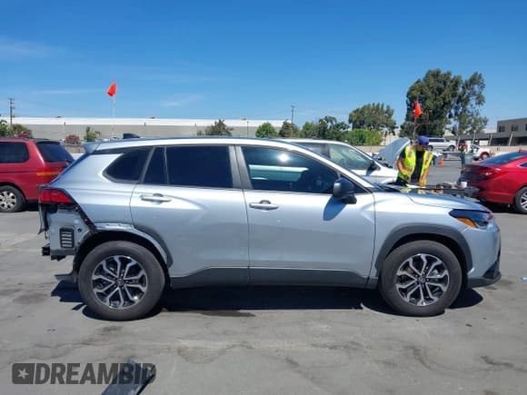 ✅ 2025 Toyota Corolla Cross Hybrid S • VIN: 7MUFBABG6SV079412 • Lot: 43030218. Listed on IAAI with 5,149 mi. Free auction sales archive from the USA and detailed vehicle history report at DreamBid. Image 13.