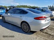 ✅ 2017 Ford Fusion Titanium • VIN: 3FA6P0K94HR401974 • Lot: 96107145. Listed on Copart with 143,236 mi. Free auction sales archive from the USA and detailed vehicle history report at DreamBid. Image 2.