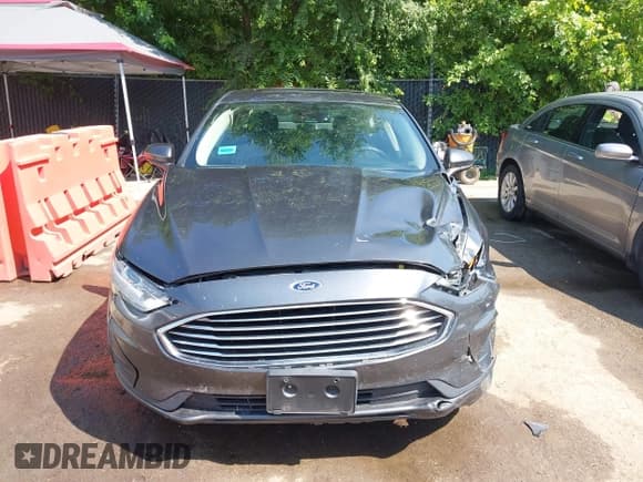 ✅ 2020 Ford Fusion SE • VIN: 3FA6P0T95LR149952 • Lot: 42902137. Listed on IAAI with 122,158 mi. Free auction sales archive from the USA and detailed vehicle history report at DreamBid. Image 12.
