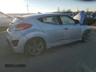 ✅ 2013 Hyundai Veloster Turbo • VIN: KMHTC6AE7DU105341 • Lot: 88179185. Wystawiony na Copart z przebiegiem Nie podano. Bezpłatny archiwum sprzedaży aukcyjnych z USA i szczegółowy raport historii pojazdu na DreamBid. Zdjęcie 3.