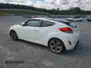 2013 Hyundai Veloster w/Gray Int z VIN KMHTC6AD6DU124843, wystawiony jako Copart lot #73250424 z przebiegiem 113 770 mil mil oraz Czysty tytuł • Clean title. Historia ofert i sprzedaży dostępna na DreamBid. Obrazek 2.