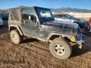 ✅ 2000 Jeep Wrangler Sport • VIN: 1J4FA49S9YP738234 • Lot: 91114555. Listed on Copart with 245,066 mi. Free auction sales archive from the USA and detailed vehicle history report at DreamBid. Image 4.