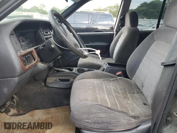 ✅ 1995 Jeep Grand Cherokee Laredo • VIN: 1J4FX58S0SC726476 • Лот: 69608784. Опубликован ранее на Copart с пробегом 264 705 миль. Бесплатный доступ к архиву аукционных продаж из США и подробный отчёт об истории автомобиля на DreamBid. Изображение 7.