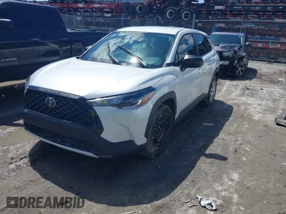 ✅ 2024 Toyota Corolla Cross L • VIN: 7MUAAAAG2RV081361 • Лот: 42971076. Опубликован ранее на IAAI с пробегом 28 980 миль. Бесплатный доступ к архиву аукционных продаж из США и подробный отчёт об истории автомобиля на DreamBid. Изображение 2.