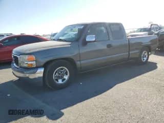 2001 GMC Sierra 1500 SLE with VIN 2GTEC19V711188927, listed as a Copart auction lot 81971045 with 219,625 mi miles and Salvage title. Bid and sale history available at DreamBid. Image 1.