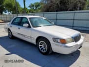 ✅ 1998 Mercury Grand Marquis GS • VIN: 2MEFM74WXWX651425 • Lot: 65161705. Listed on Copart with 154,289 mi. Free auction sales archive from the USA and detailed vehicle history report at DreamBid. Image 4.