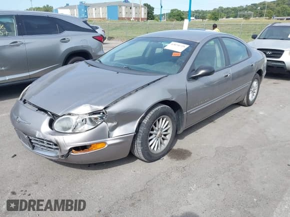✅ 1999 Chrysler Concorde • VIN: 2C3HD46J2XH558909 • Lot: 43070725. Listed on IAAI with 118,396 mi. Free auction sales archive from the USA and detailed vehicle history report at DreamBid. Image 2.