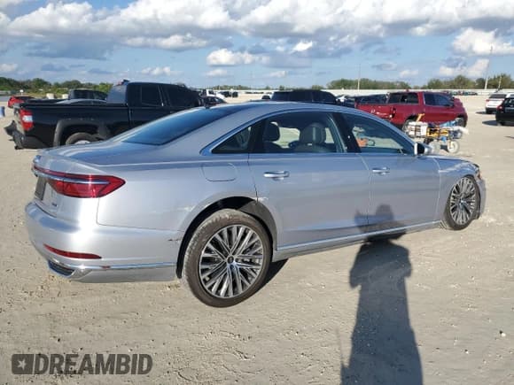 ✅ 2021 Audi A8 • VIN: WAU8DAF84MN018145 • Лот: 86952454. Опубликован ранее на Copart с пробегом 33 336 миль. Бесплатный доступ к архиву аукционных продаж из США и подробный отчёт об истории автомобиля на DreamBid. Изображение 3.