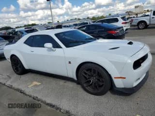 ✅ 2022 Dodge Challenger R/T Scat Pack Widebody • VIN: 2C3CDZFJXNH261049 • Lot: 73869024. Wystawiony na Copart z przebiegiem Nie podano. Bezpłatny archiwum sprzedaży aukcyjnych z USA i szczegółowy raport historii pojazdu na DreamBid. Zdjęcie 4.