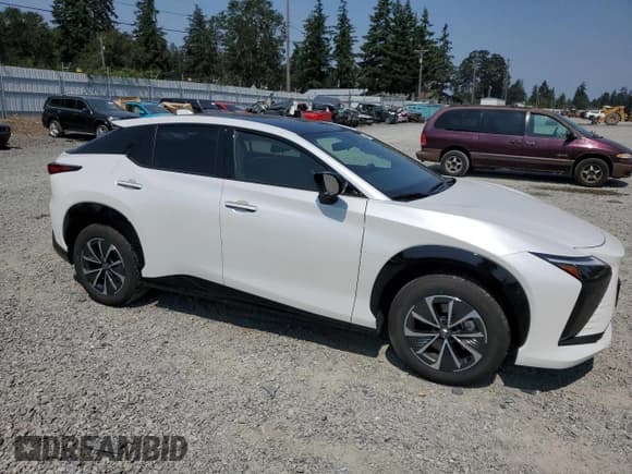 ✅ 2023 Lexus RZ 450e Premium • VIN: JTJAAAAB7PA020545 • Lot: 66806794. Listed on Copart with 7,177 mi. Free auction sales archive from the USA and detailed vehicle history report at DreamBid. Image 4.