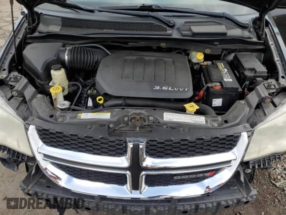 2012 Dodge Grand Caravan SXT z VIN 2C4RDGCG4CR295109, wystawiony jako Copart lot #71798585 z przebiegiem 84 778 mil mil oraz Szkoda całkowita • Salvage title. Historia ofert i sprzedaży dostępna na DreamBid. Obrazek 12.