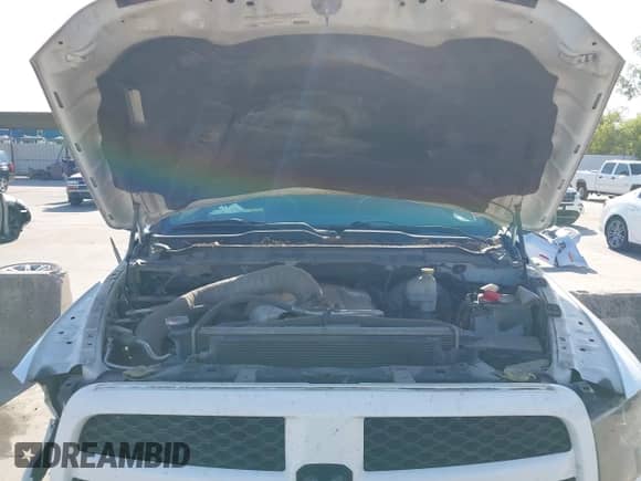 2013 Ram 1500 Express z VIN 3C6JR6ATXDG508202, wystawiony jako IAAI lot #43296958 z przebiegiem 145 380 mil mil oraz . Historia ofert i sprzedaży dostępna na DreamBid. Obrazek 10.