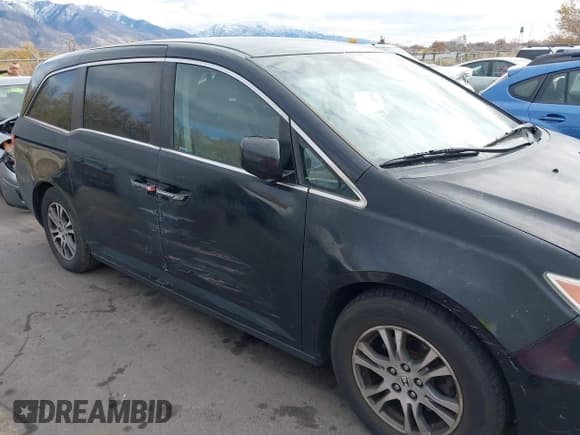 ✅ 2013 Honda Odyssey EX • VIN: 5FNRL5H44DB075407 • Lot: 43725774. Listed on IAAI with 192,101 mi. Free auction sales archive from the USA and detailed vehicle history report at DreamBid. Image 6.