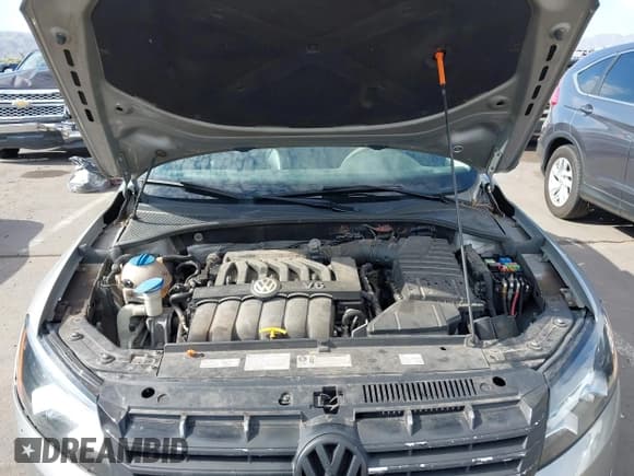 ✅ 2013 Volkswagen Passat SEL Premium • VIN: 1VWCM7A32DC035076 • Лот: 42659434. Опубликован ранее на IAAI с пробегом 99 807 миль. Бесплатный доступ к архиву аукционных продаж из США и подробный отчёт об истории автомобиля на DreamBid. Изображение 10.