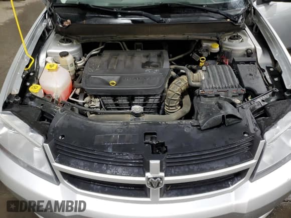 ✅ 2010 Dodge Avenger SXT • VIN: 1B3CC4FB1AN169194 • Лот: 80318604. Опубликован ранее на Copart с пробегом 106 184 миль. Бесплатный доступ к архиву аукционных продаж из США и подробный отчёт об истории автомобиля на DreamBid. Изображение 11.