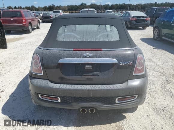 ✅ 2013 MINI Convertible S • VIN: WMWZP3C58DT297967 • Лот: 74693914. Опубликован ранее на Copart с пробегом Не указан. Бесплатный доступ к архиву аукционных продаж из США и подробный отчёт об истории автомобиля на DreamBid. Изображение 6.