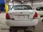 2003 Hyundai Elantra GLS z VIN KMHDN45D23U489919, wystawiony jako Copart lot #83390934 z przebiegiem Nie podano mil oraz Szkoda całkowita • Salvage title. Historia ofert i sprzedaży dostępna na DreamBid. Obrazek 6.