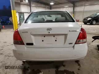 2003 Hyundai Elantra GLS z VIN KMHDN45D23U489919, wystawiony jako Copart lot #83390934 z przebiegiem Nie podano mil oraz Szkoda całkowita • Salvage title. Historia ofert i sprzedaży dostępna na DreamBid. Obrazek 6.