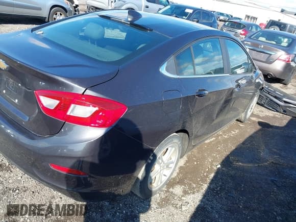 ✅ 2016 Chevrolet Cruze LT • VIN: 1G1BE5SMXG7273321 • Lot: 43491200. Listed on IAAI with 174,729 mi. Free auction sales archive from the USA and detailed vehicle history report at DreamBid. Image 4.