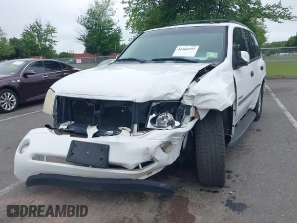 ✅ 2006 GMC Envoy SLE • VIN: 1GKDT13S762251921 • Lot: 42460295. Listed on IAAI with 206,063 mi. Free auction sales archive from the USA and detailed vehicle history report at DreamBid. Image 17.