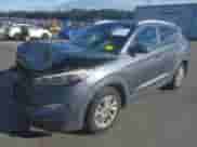 2016 Hyundai Tucson SE with VIN KM8J3CA48GU053428, listed as a IAAI auction lot 43407227 with 121,790 mi miles and . Bid and sale history available at DreamBid. Image 2.