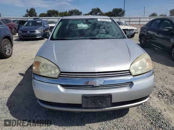 2004 Chevrolet Malibu z VIN 1G1ZS52F74F242814, wystawiony jako Copart lot #66764714 z przebiegiem 228 578 mil mil oraz Czysty tytuł • Clean title. Historia ofert i sprzedaży dostępna na DreamBid. Obrazek 5.