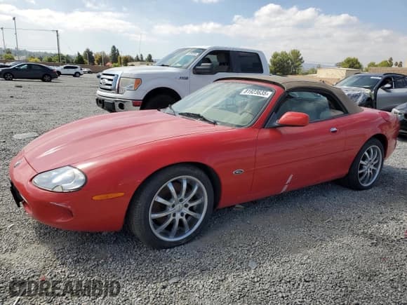 ✅ 1999 Jaguar XK • VIN: SAJGX2044XC038236 • Lot: 81923635. Listed on Copart with 44,616 mi. Free auction sales archive from the USA and detailed vehicle history report at DreamBid. Image 1.