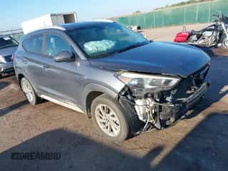 2017 Hyundai Tucson SE z VIN KM8J33A43HU529862, wystawiony jako IAAI lot #43020605 z przebiegiem 116 936 mil mil oraz . Historia ofert i sprzedaży dostępna na DreamBid. Obrazek 1.