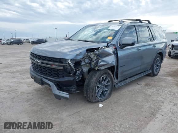 2022 Chevrolet Tahoe Z71 z VIN 1GNSKPKD2NR309121, wystawiony jako IAAI lot #41352421 z przebiegiem 18 933 mil mil oraz . Historia ofert i sprzedaży dostępna na DreamBid. Obrazek 17.